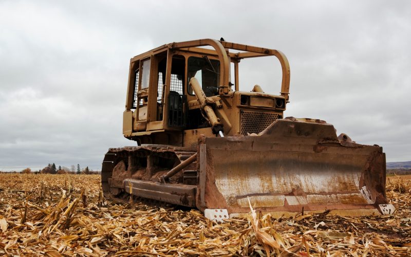 An,Old,Bulldozer,Sits,In,A,Farmers,Field,Of,Rotting